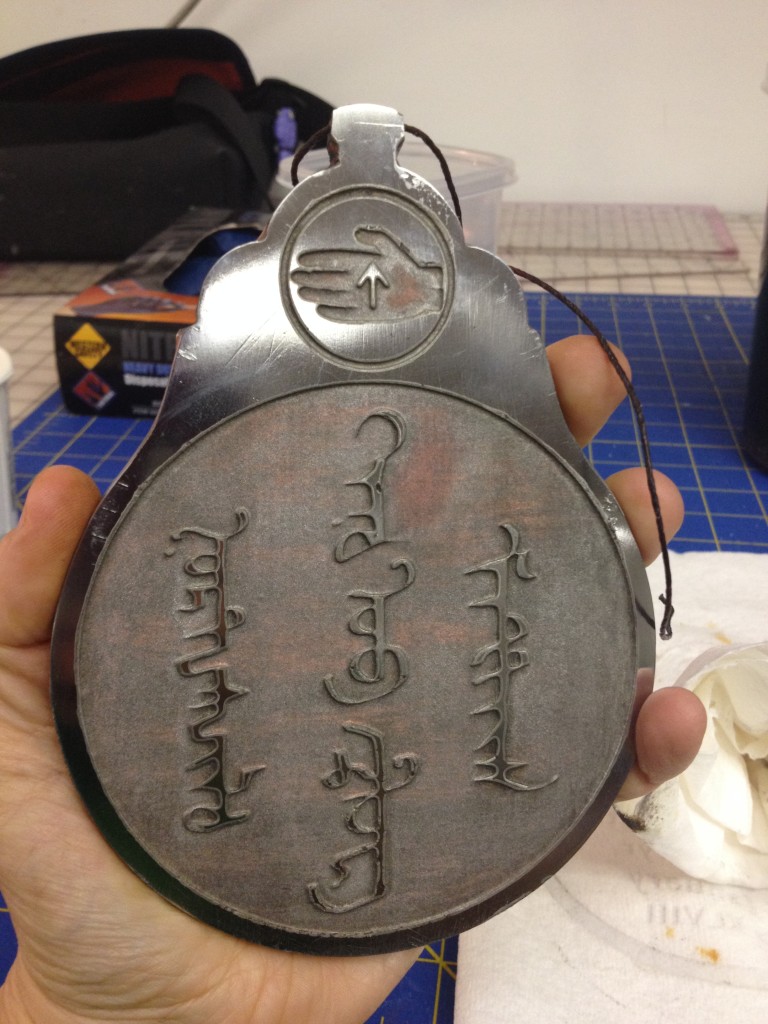 Etching the scroll